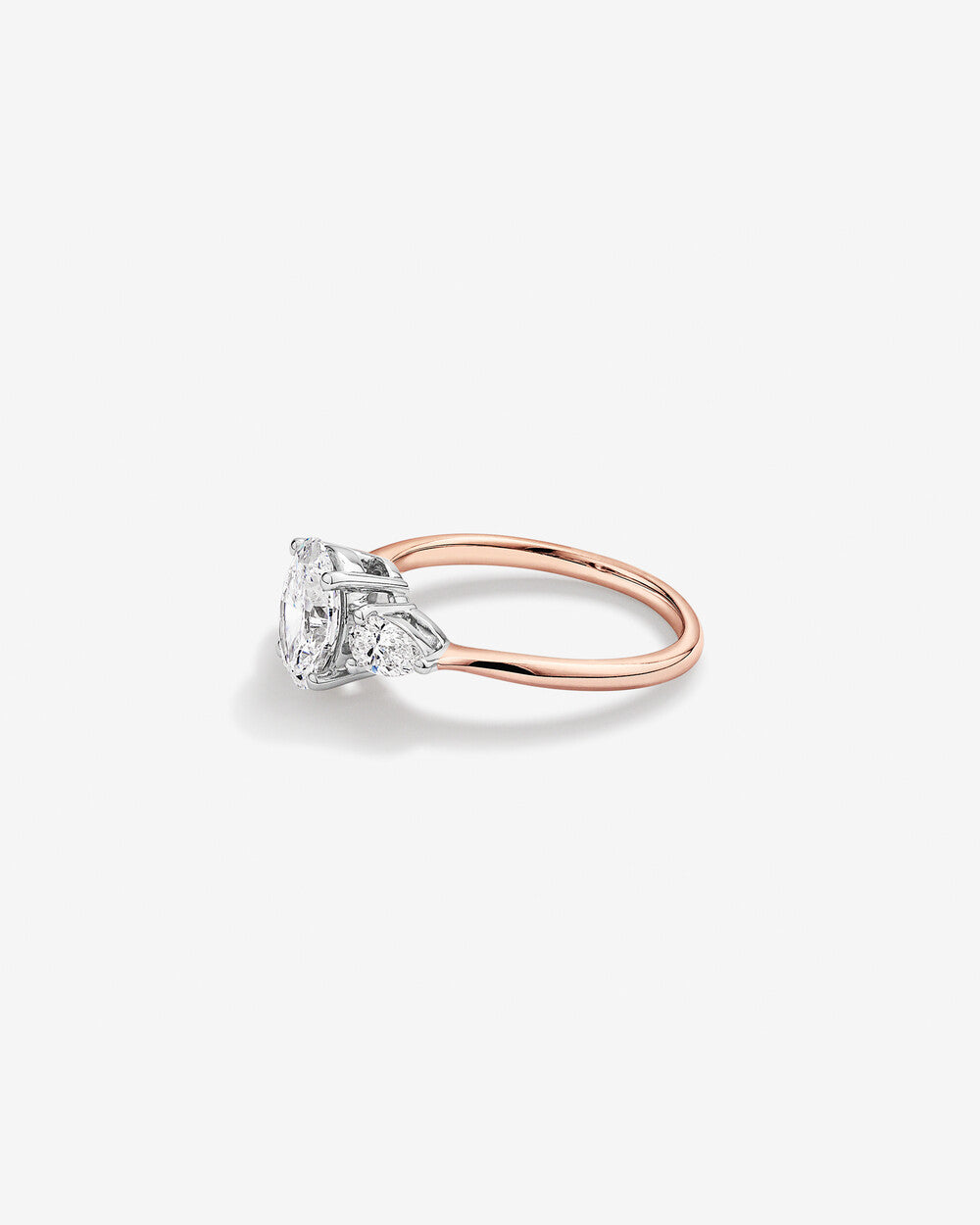 1.70 Carat TW Three Stone Oval and Pear Shaped Lab-Grown Diamond Engagement Ring in 14kt Rose and White Gold