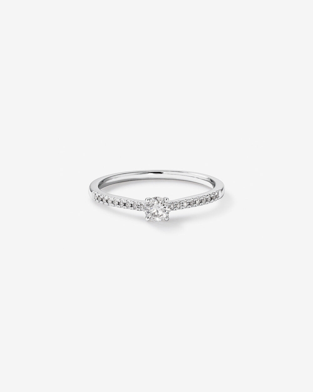 0.30 Carat TW Round Brilliant Diamond Side Accent Engagement Ring in 14k Gold