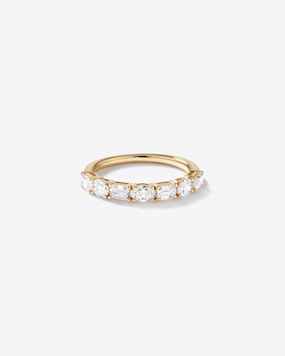 1.10 Carat Prong Set Emerald and Oval Cut Lab Grown Diamond Wedding Band in 14k Yellow Gold