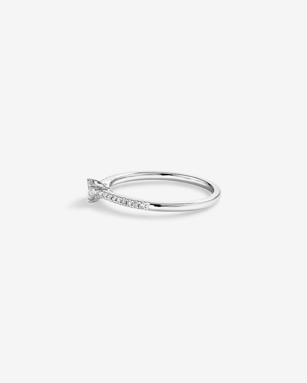 0.30 Carat TW Round Brilliant Diamond Side Accent Engagement Ring in 14k Gold