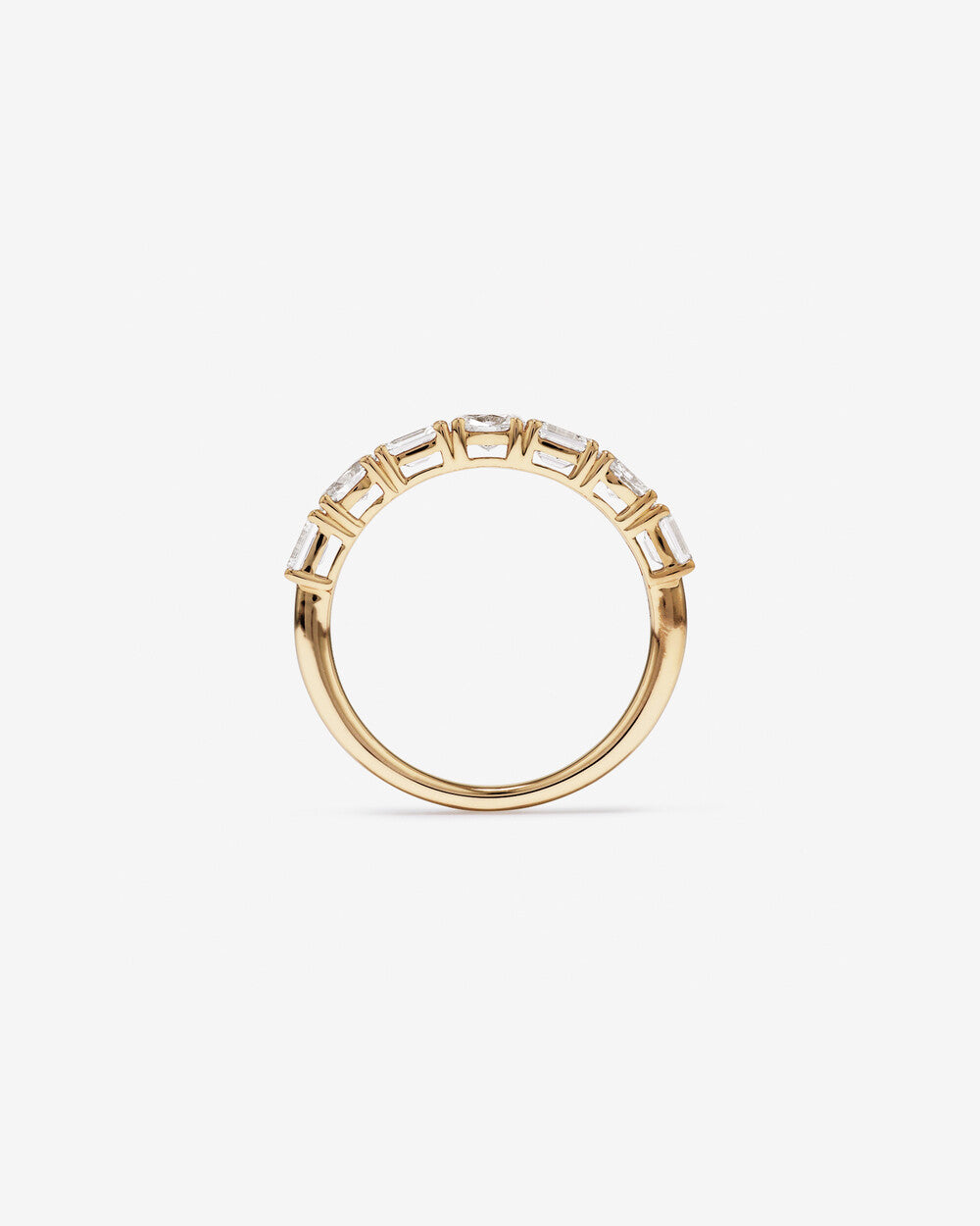 1.10 Carat Prong Set Emerald and Oval Cut Lab Grown Diamond Wedding Band in 14k Yellow Gold